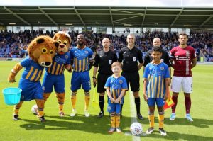 Mascots line up before kick off